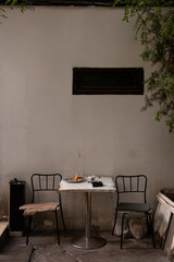Table with chairs in the back of a restaurant