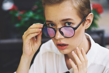 portrait of a girl in glasses