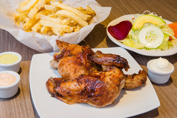 Delicious grilled chicken with french fries