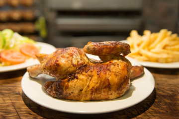 Delicious grilled chicken with french fries
