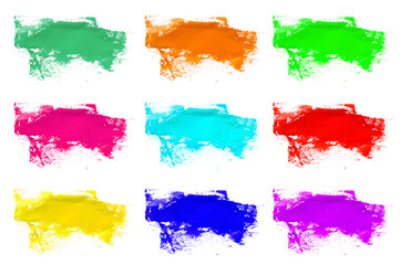 Fototapeta na wymiar colorful palette of paints on a white isolate background