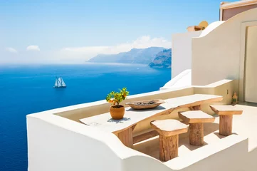 Fototapeten White architecture on Santorini island, Greece. Beautiful sea view. Famous travel destination © smallredgirl