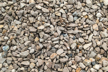 Texture background of light gravel and stones
