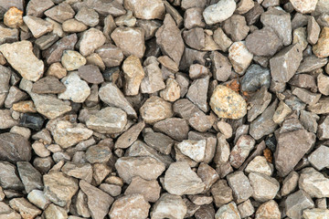 Texture background of light gravel and stones