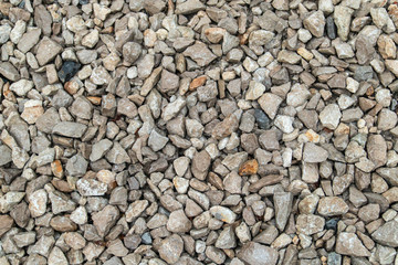 Texture background of light gravel and stones