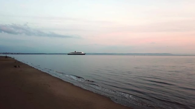 Magnificent Queen Mary Royal Cruise Ship Leaving Liverpool Via Crosby Marina Into Sunset Evening.