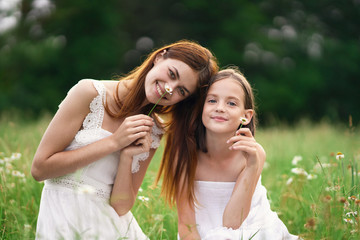 mother and daughter having fun in the park