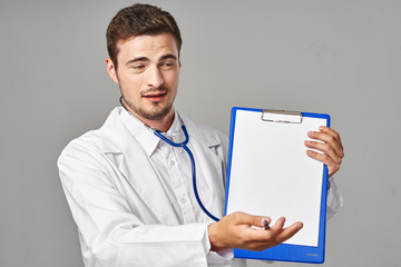 young doctor with clipboard