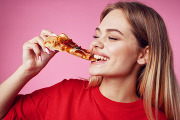woman eating pizza