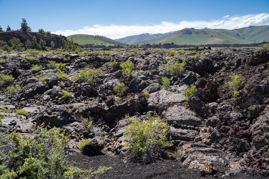 Black volcanic rock and lava flow fields in Craters of the Moon National Monument