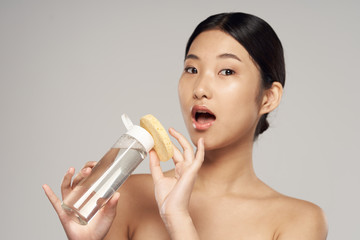 portrait of a young beautiful smiling woman with perfect skin