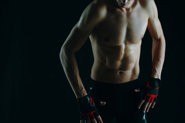 Naklejka premium muscular man in studio