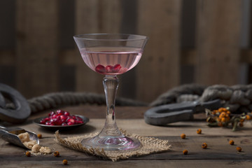 shot of pomegranate on wooden table