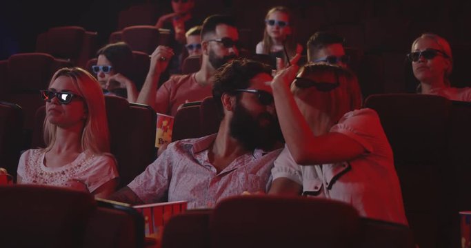 Couple disturbing cinema audience with talking