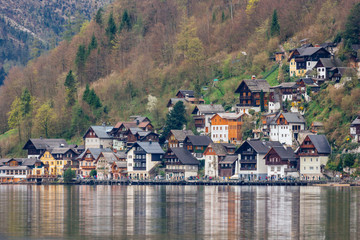 Fototapeta na wymiar Town Hallstatt with mountain lake and salt mines. Alpine massif, beautiful canyon in Austria. Salzburg Alpine valley in summer, clear water. Destination for vacation, hiking and relaxation.