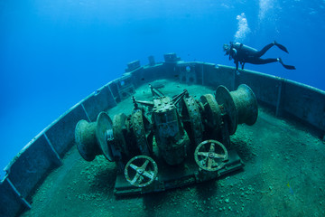 A diver explores the USS Kittiwake, one of the best-known wreck dives in the Caribbean Sea. The...