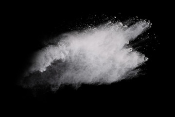 Fototapeta premium White powder explosion on black background. Colored cloud. Colorful dust explode. Paint Holi.