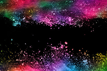 abstract colored dust explosion on a black background.abstract powder splatted background,Freeze...