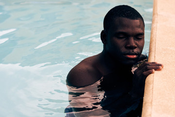 young man in swimming pool