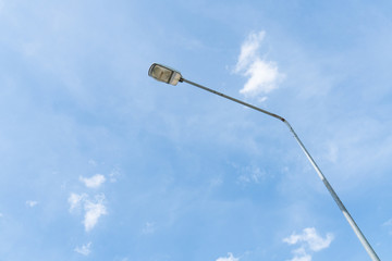 Street light with blue sky.