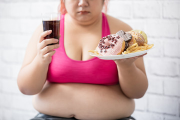 plus size girl with dessert
