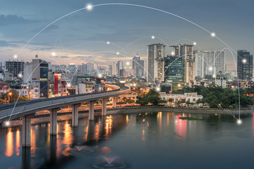 Smart city and wireless communication network concept. Digital network connection lines of Hanoi at Hoang Cau lake