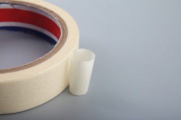 Adhesive tape on gray background