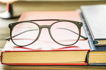 Close up Eye glasses and books