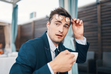 portrait of a businessman with thumb up