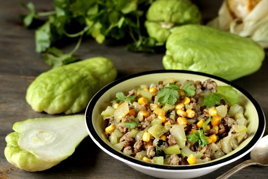 chayote dish with minced meat and corn. Latin American dish.  mexican dish "Picadillo de chayote"  