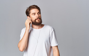 Fototapeta premium young man talking on the phone isolated on white