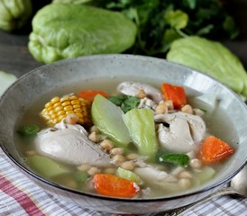 soup with chayote and chicken, corn, carrots and chickpeas. Latin American cuisine. dish with chayote. 
