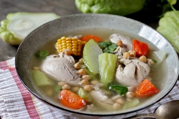 soup with chayote and chicken, corn, carrots and chickpeas. Latin American cuisine. dish with chayote. 