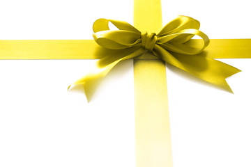 Fototapeta premium Gold ribbon with a bow as a gift on a white background