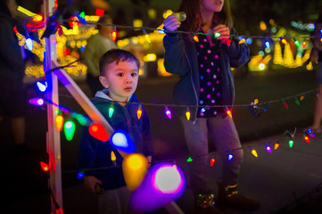 Toddler enjoying christmas light display