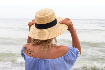 Woman in blue sundress