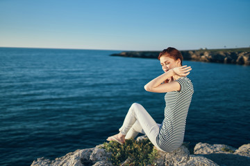 Naklejka premium young woman on the beach