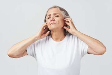 portrait of a man with headache isolated on white