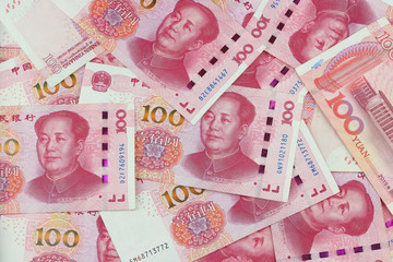 Top view of chinese banknote  100 YUAN spread background..