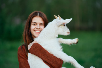 young girl with her goat