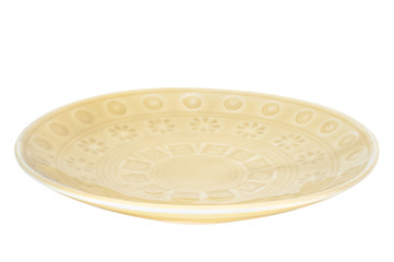 Golden plate isolated on white background.