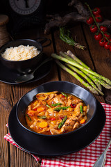 colorful turkey fricassee with asparagus and paprika