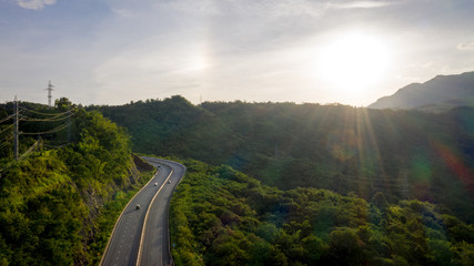 Aerial view of mountains and chewed roads on the mountain during sunset at Khao Kho Viewpoint, Phetchabun Province, Thailand