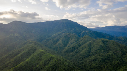 Aerial view of mountains and chewed roads on the mountain during sunset at Khao Kho Viewpoint, Phetchabun Province, Thailand
