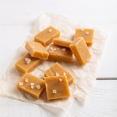 Salted caramel pieces and sea salt. Fresh caramel fudge candies