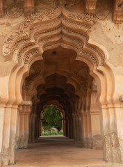Fototapeta na wymiar Beautiful carved stone architecture of Lotus Mahal in Hampi, Karnataka, India.