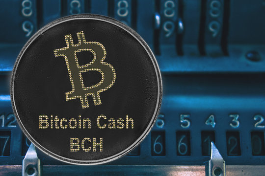 Coin cryptocurrency BCH against the numbers of the arithmometer. Bitcoin Cash