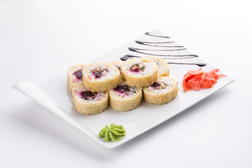 Tempura Maki Sushi Deep Fried Roll with beetroot and Cream Cheese isolated on white background
