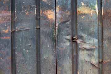 Metal door rusty corroded texture background.