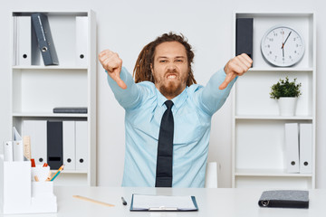 portrait of young man in an office